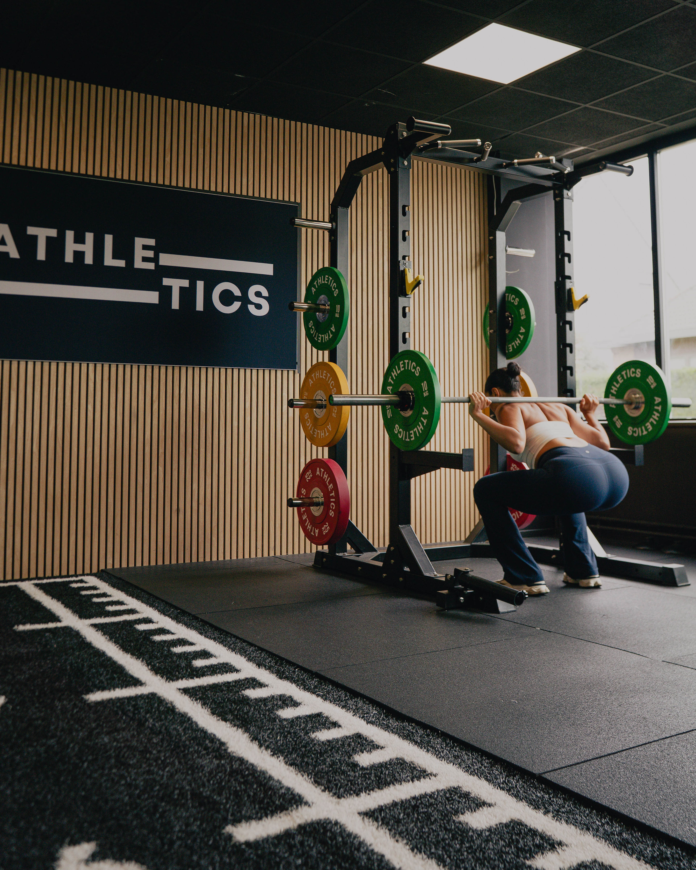 Squat avec barre olympique